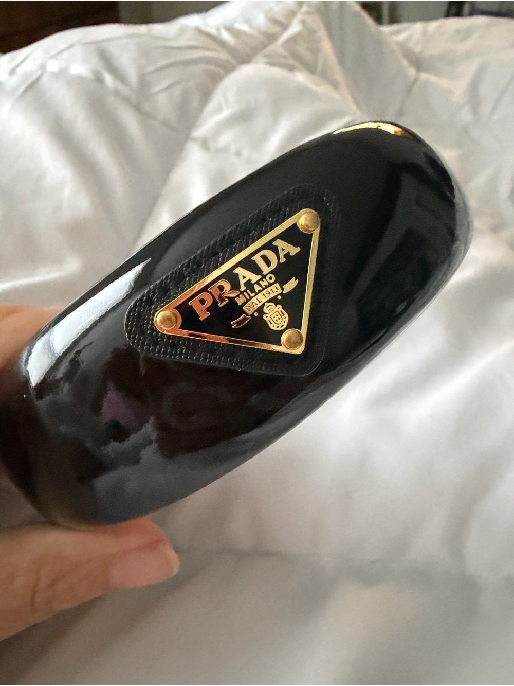 Prada Black Lacquer Hair Band with Gold Triangle Emblem